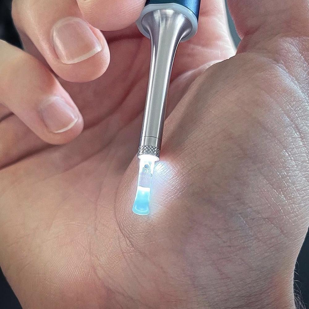 Ear cleaner with chamber