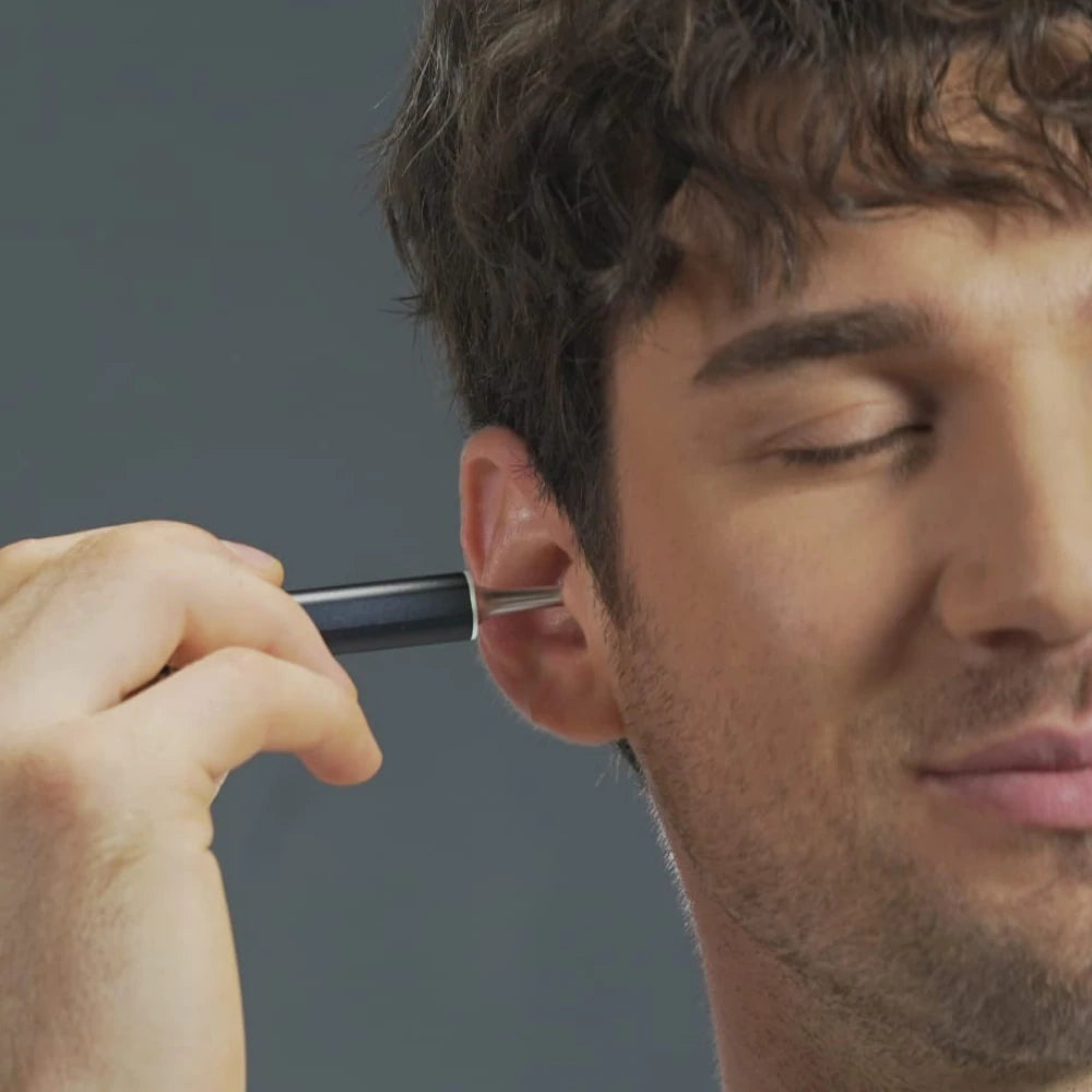 Ear cleaner with chamber